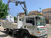 San Ginés, La Alberca contenedor camión